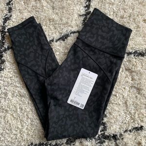 Lululemon In Movement Tight 25”, size 6 formation camo deep coal multi